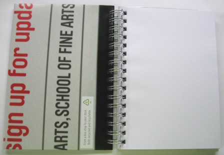 Inside view of recycled poster notebook using a Creative NZ campaign